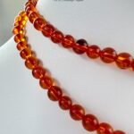 鸽子血红珀长串 Pigeon Blood Red Amber L/Strand