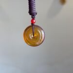 WhatsApp Image 2025-08-20 at 12.10.10 PM (1) 琥珀平安扣吊坠 Amber Peace Pendant