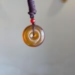 WhatsApp Image 2025-08-20 at 12.10.10 PM 琥珀平安扣吊坠 Amber Peace Pendant