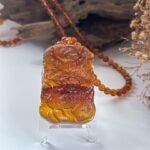 WhatsApp Image 2025-09-10 at 4.32.49 PM (1) 琥珀龙牌吊坠 Amber Dragon Pendant