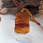 WhatsApp Image 2025-09-10 at 4.32.49 PM (2) 琥珀龙牌吊坠 Amber Dragon Pendant
