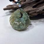 镂空茶黄麒麟吊坠 Hollow-Carved Tea Yellow Qilin Pendant